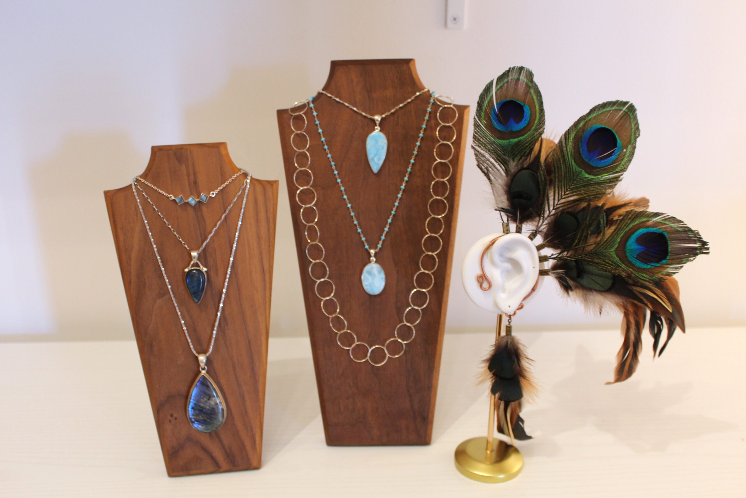 Elegant layered gold jewelry featuring star, crystal, heart, and butterfly accents, perfect for adding a touch of Sedona-inspired sparkle