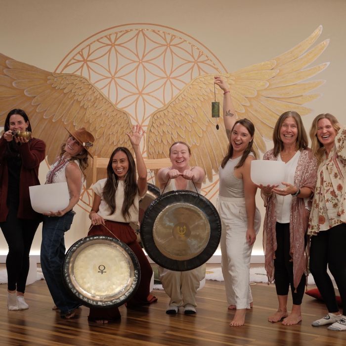A community of sound healing students gathered in Sedona for an immersive certification retreat, learning sound bath techniques together.